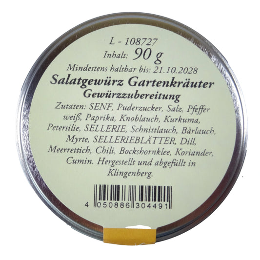 Altes Gewürzamt Salatgewürz Gartenkräuter Klassische Vinaigrette-Basis, grüne Gewürzdose von oben auf hellem Hintergrund
