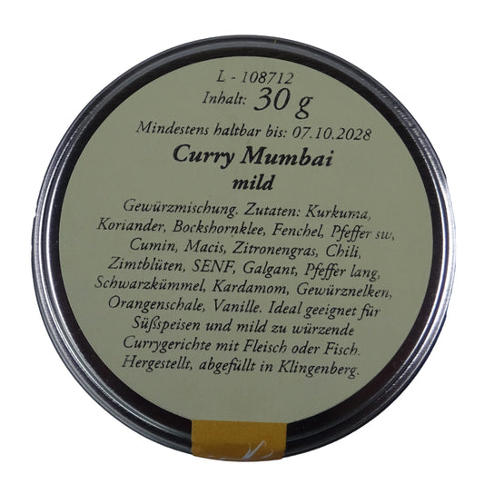 Altes Gewürzamt Curry Mumbai Mild-fruchtige Premium-Currymischung, grüne Gewürzdose Ansicht Deckel auf hellem Hintergrund