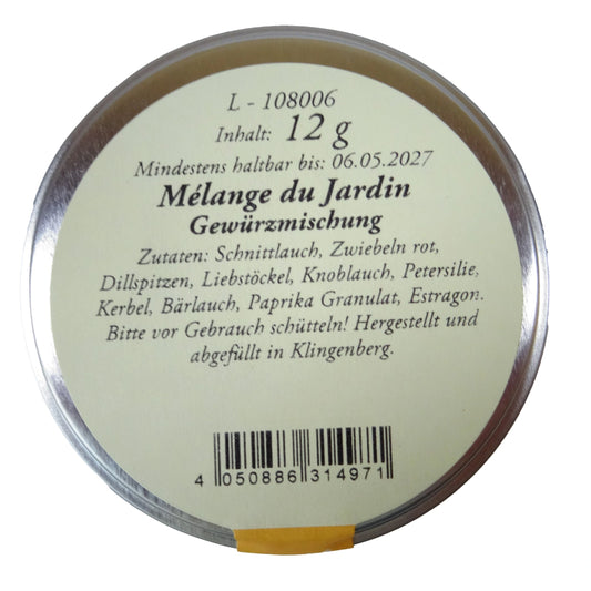 Altes Gewürzamt Mélange du Jardin Kräutermischung, grüne Gewürzdose on oben auf hellem Hintergrund