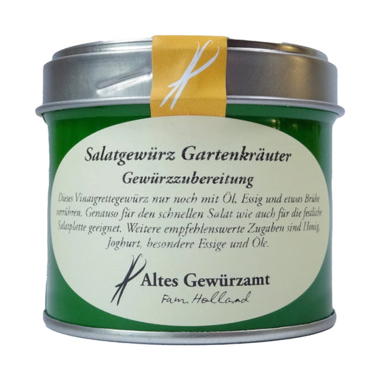Altes Gewürzamt Salatgewürz Gartenkräuter Klassische Vinaigrette-Basis, grüne Gewürzdose auf hellem Hintergrund