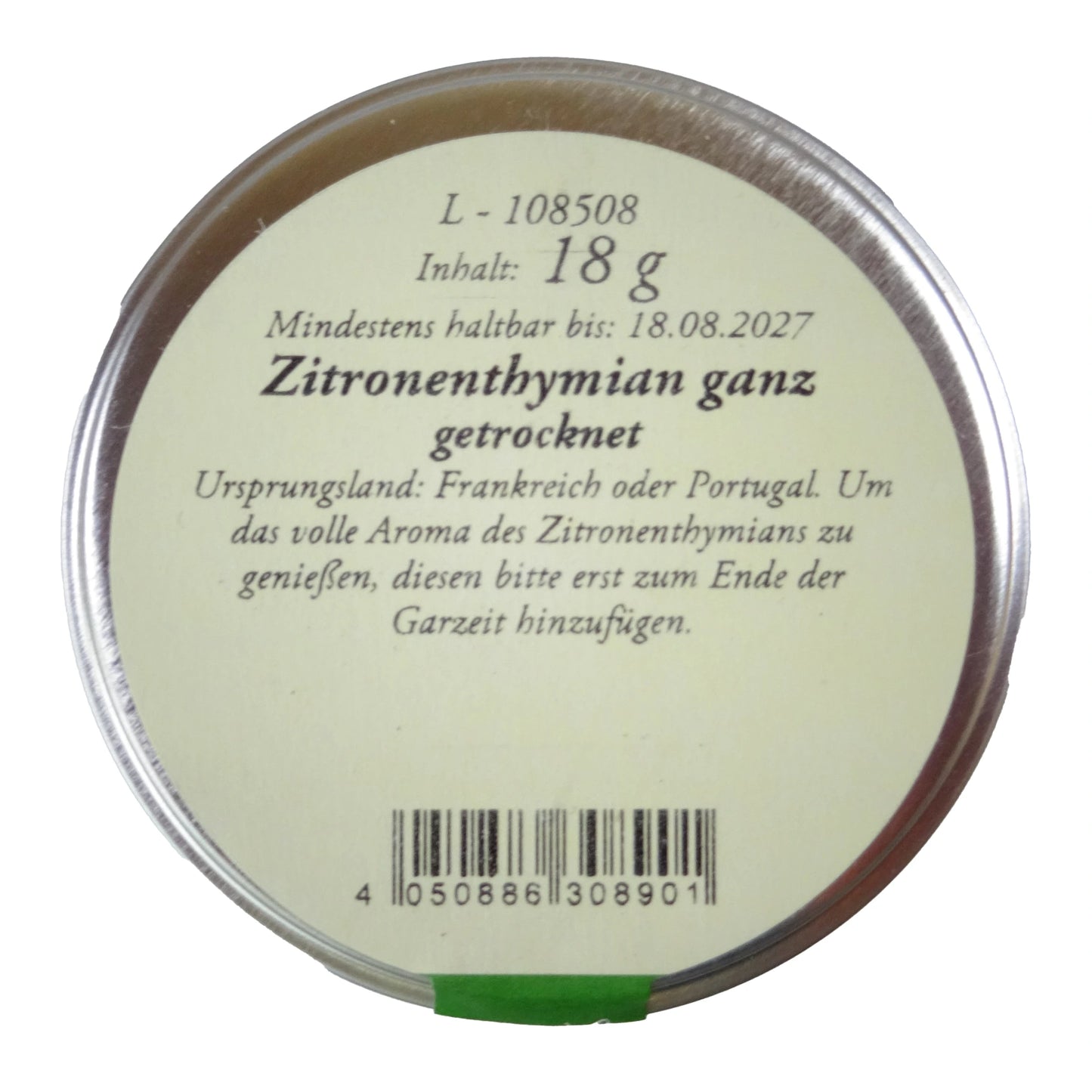 Altes Gewürzamt Zitronenthymian Reines mediterranes Premium-Würzkraut, grüne Gewürzdose von oben auf hellem Hintergrund