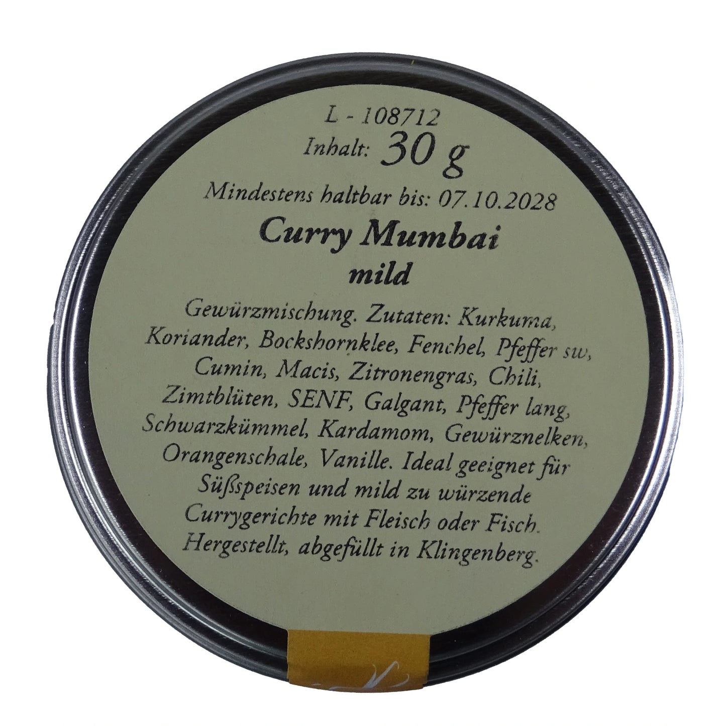 Altes Gewürzamt Curry Mumbai Mild-fruchtige Premium-Currymischung, grüne Gewürzdose Ansicht Deckel auf hellem Hintergrund