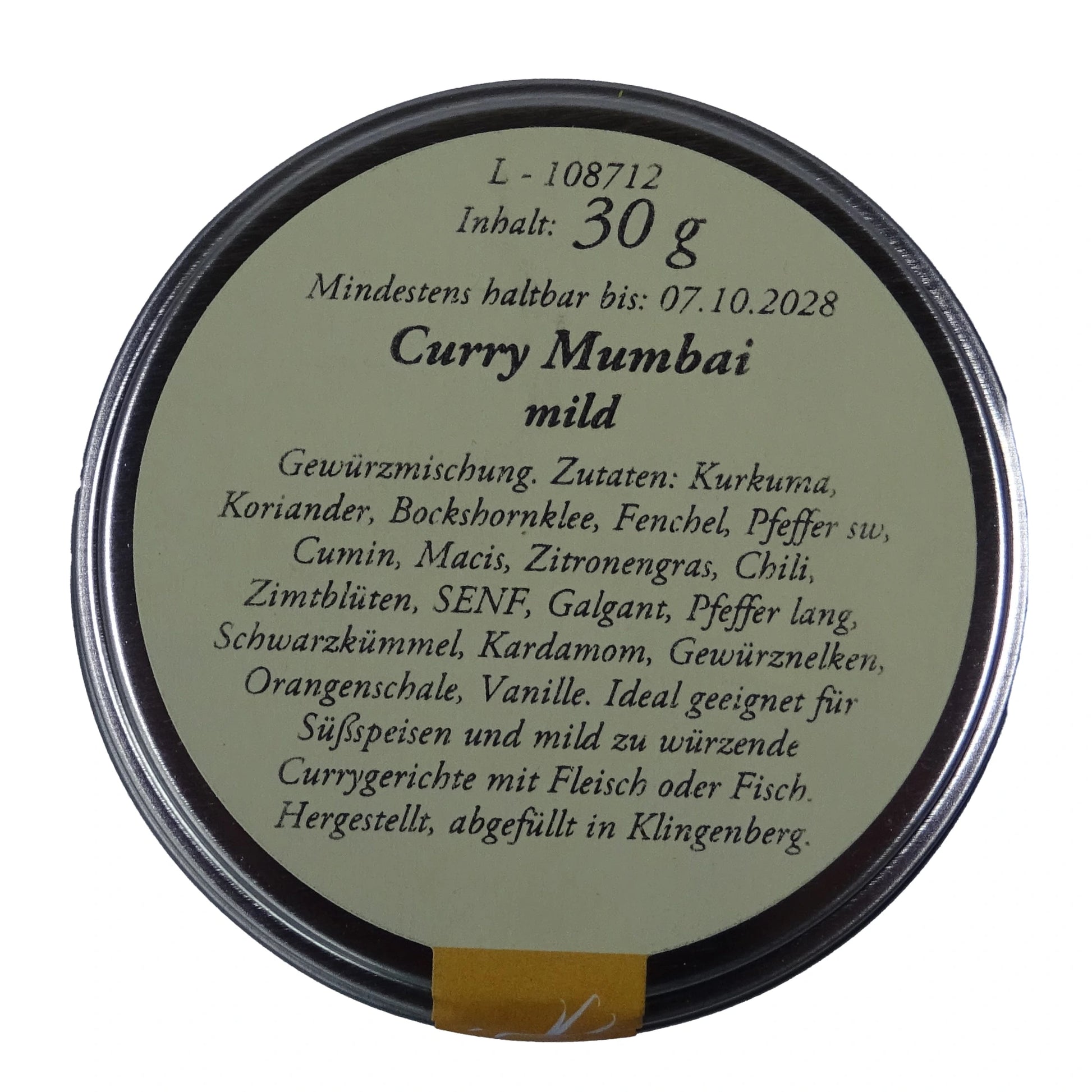 Altes Gewürzamt Curry Mumbai Mild-fruchtige Premium-Currymischung, grüne Gewürzdose Ansicht Deckel auf hellem Hintergrund