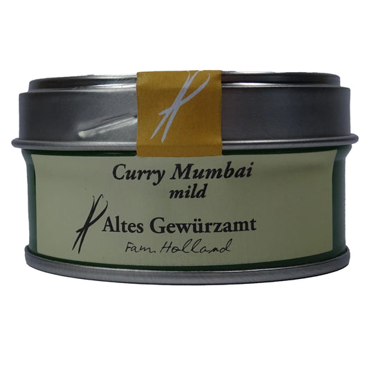 Altes Gewürzamt Curry Mumbai Mild-fruchtige Premium-Currymischung, grüne Gewürzdose auf hellem Hintergrund