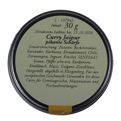 Altes Gewürzamt Curry Jaipur Pikant-frische Premium-Currymischung, grüne Gewürzdose Ansicht Deckel auf hellem Hintergrund