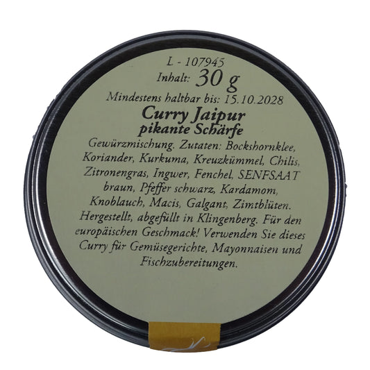 Altes Gewürzamt Curry Jaipur Pikant-frische Premium-Currymischung, grüne Gewürzdose Ansicht Deckel auf hellem Hintergrund
