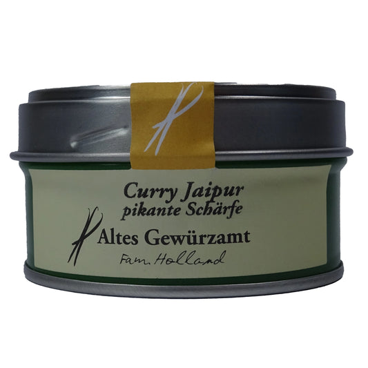 Altes Gewürzamt Curry Jaipur Pikant-frische Premium-Currymischung, grüne Gewürzdose auf hellem Hintergrund