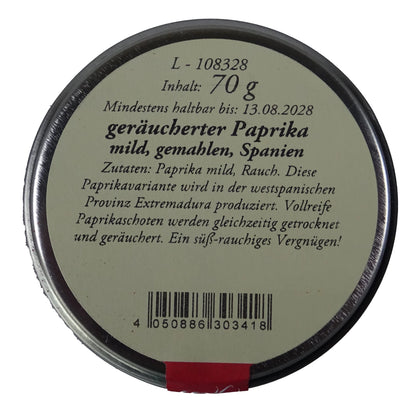 Altes Gewürzamt Geräucherter Paprika mild Pimentón de la Vera Dulce, grüne Gewürzdose Ansicht Deckel auf hellem Hintergrund