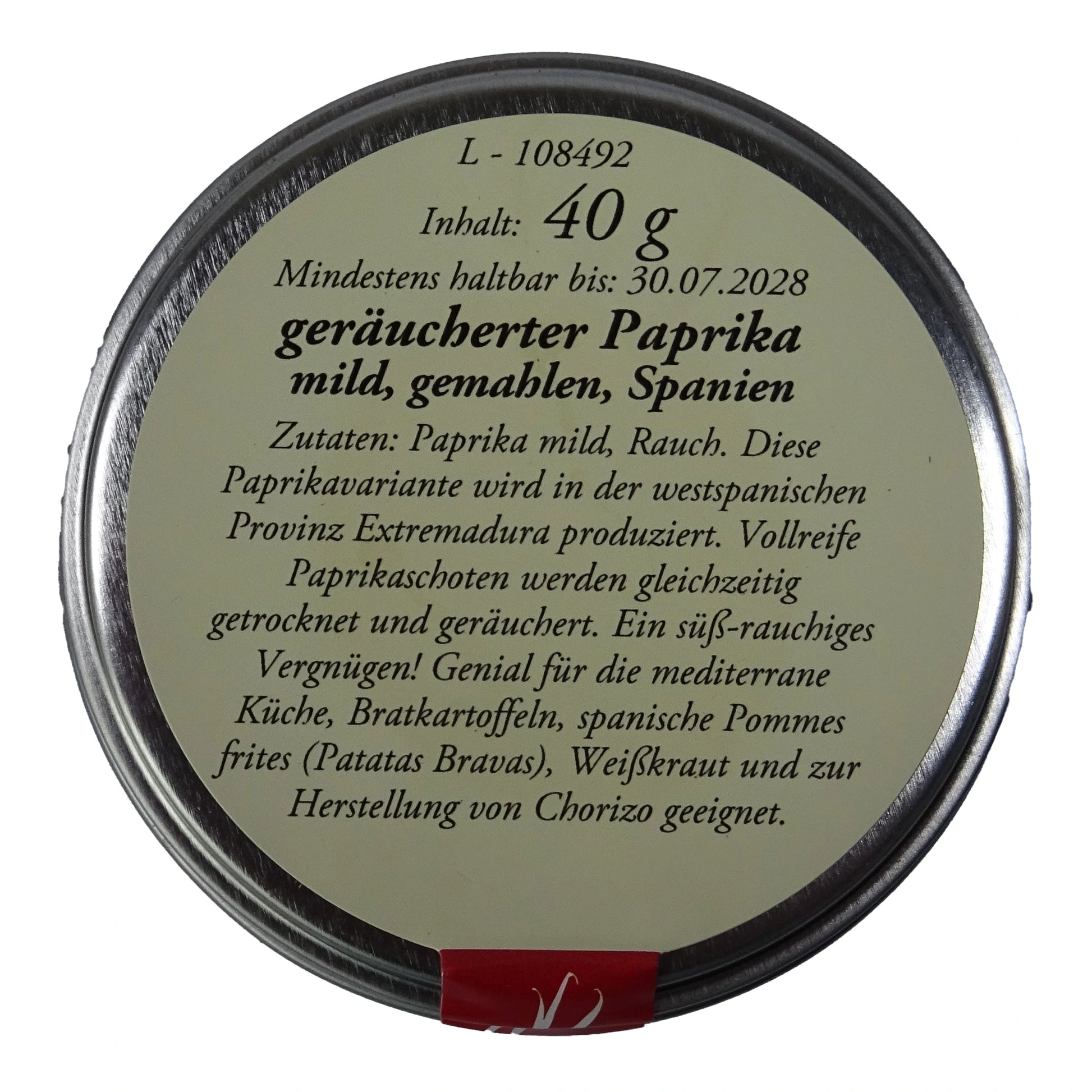 Altes Gewürzamt Geräucherter Paprika mild Pimentón de la Vera Dulce, grüne Gewürzdose Ansicht Deckel auf hellem Hintergrund
