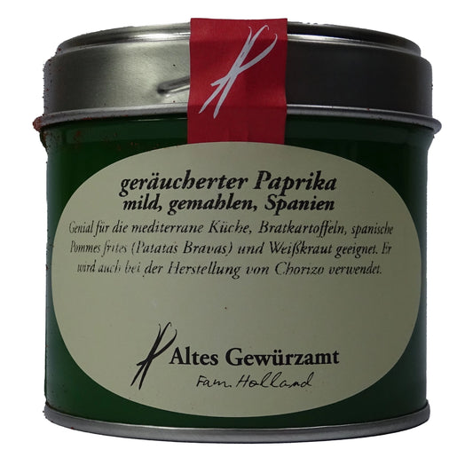 Altes Gewürzamt Geräucherter Paprika mild Pimentón de la Vera Dulce, grüne Gewürzdose auf hellem Hintergrund