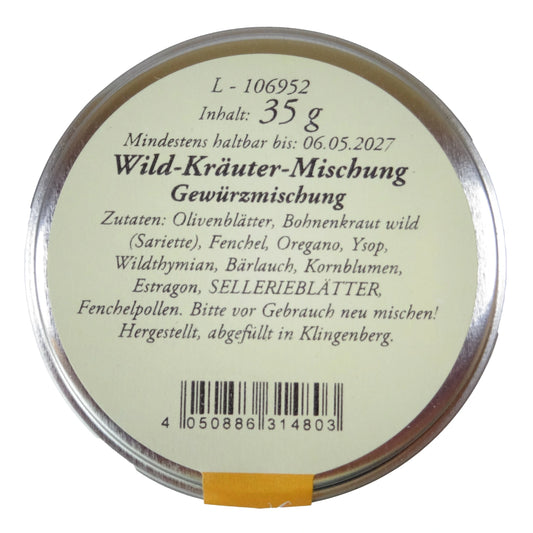 Altes Gewürzamt Wild-Kräuter-Mischung 11 mediterrane Wildkräuter und Blüten, grüne Gewürzdose von oben auf hellem Hintergrund