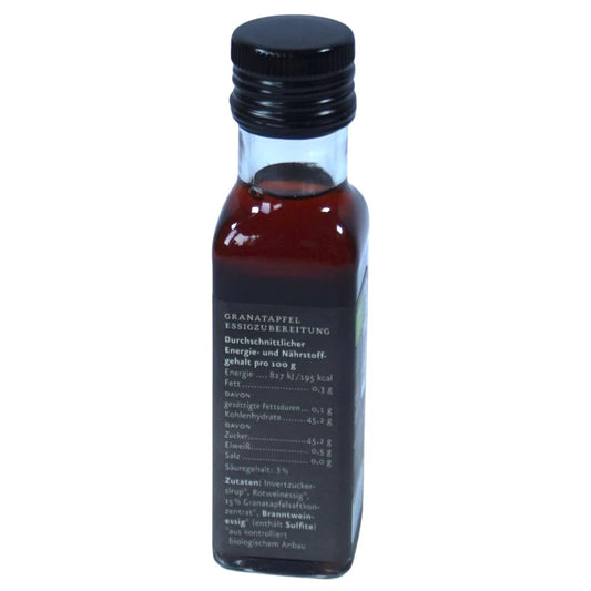 Ölmühe Solling Etikett Rückseite Bio Granatpfel Essigcreme in der 100ml Flasche auf weißem Hintergrund