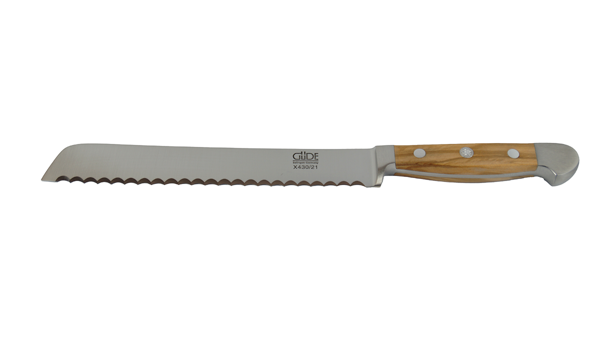 GÜDE Brotmesser X430/21RL Alpha Olive mit 21 cm Klingenlänge und Olivenholz-Griff für rechts- und Linkshänder auf weißem Hintergrund