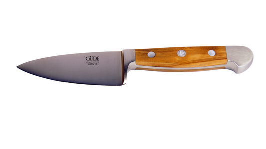 GÜDE Hartkäsemesser Alpha Olive X805/10 mit 10 cm Klingenlänge und Olivenholz-Griff auf weißem Hintergrund