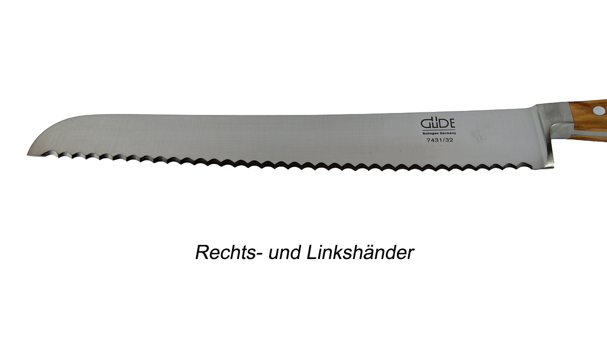 GÜDE Klinge des Brotmesser 7431/32 Alpha Olive mit 32 cm Klingenlänge und Olivenholz-Griff für Rechts- und Linkshänder auf weißem Hintergrund