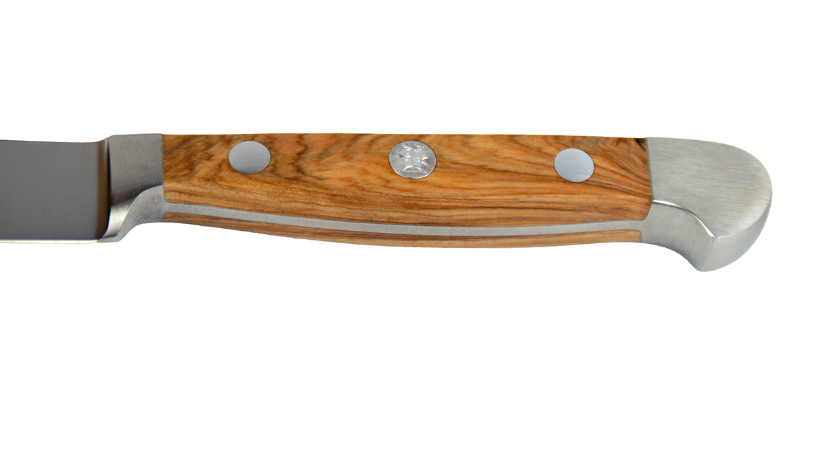 GÜDE Olivenholz-Griff des Porterhouse Steakmesser Alpha Olive X380/12 mit 12 cm Klingenlänge und Olivenholz-Griff auf weißem Hintergrund
