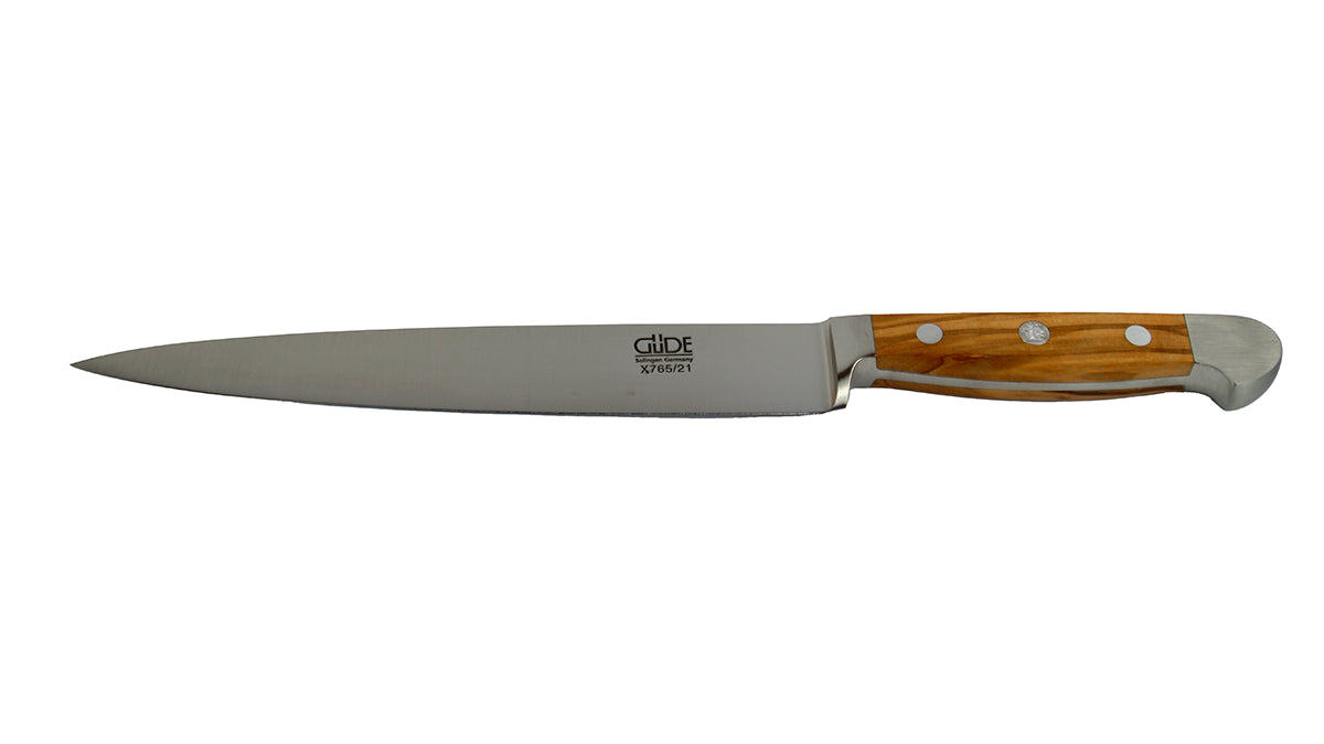GÜDE Schinkenmesser Alpha Olive X765/21 mit 21 cm Klingenlänge und Olivenholz-Griff auf weißem Hintergrund