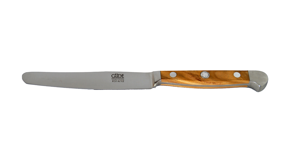 GÜDE Tafelmesser Alpha Olive X314/12 mit 12 cm Klingenlänge und Olivenholz-Griff auf weißem Hintergrund
